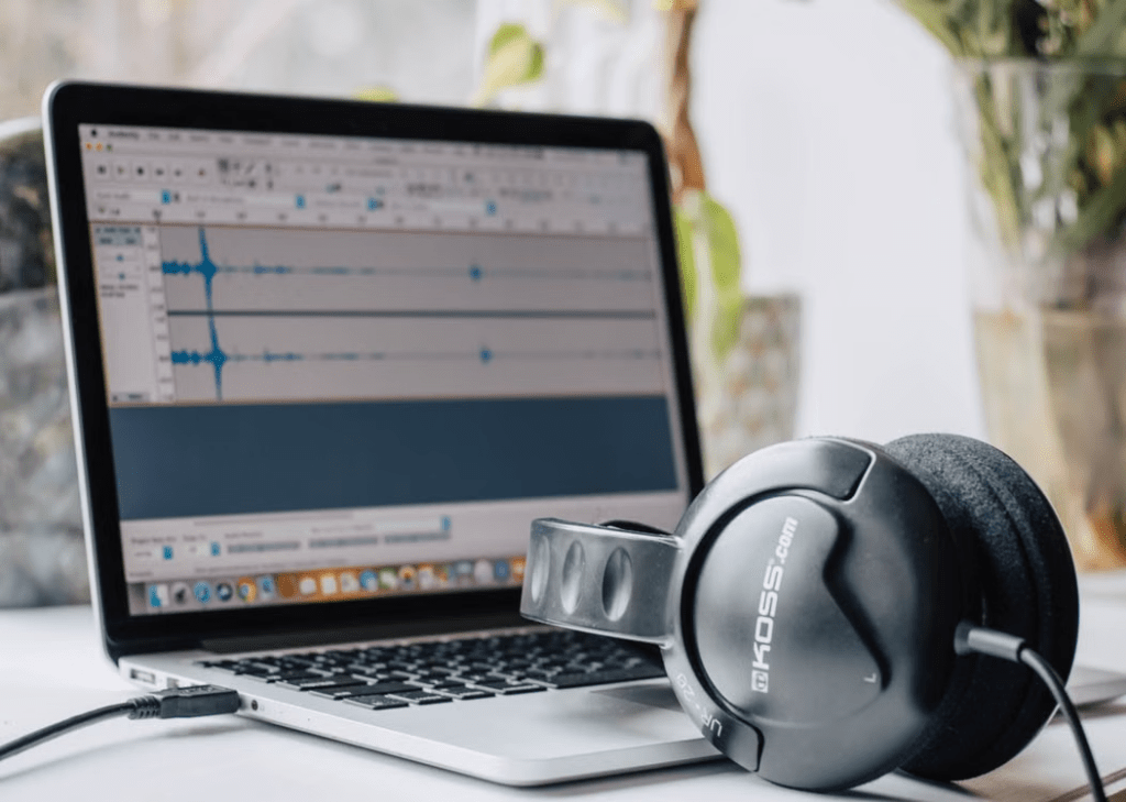 Audio editing and replay recovery with headphones and video software.